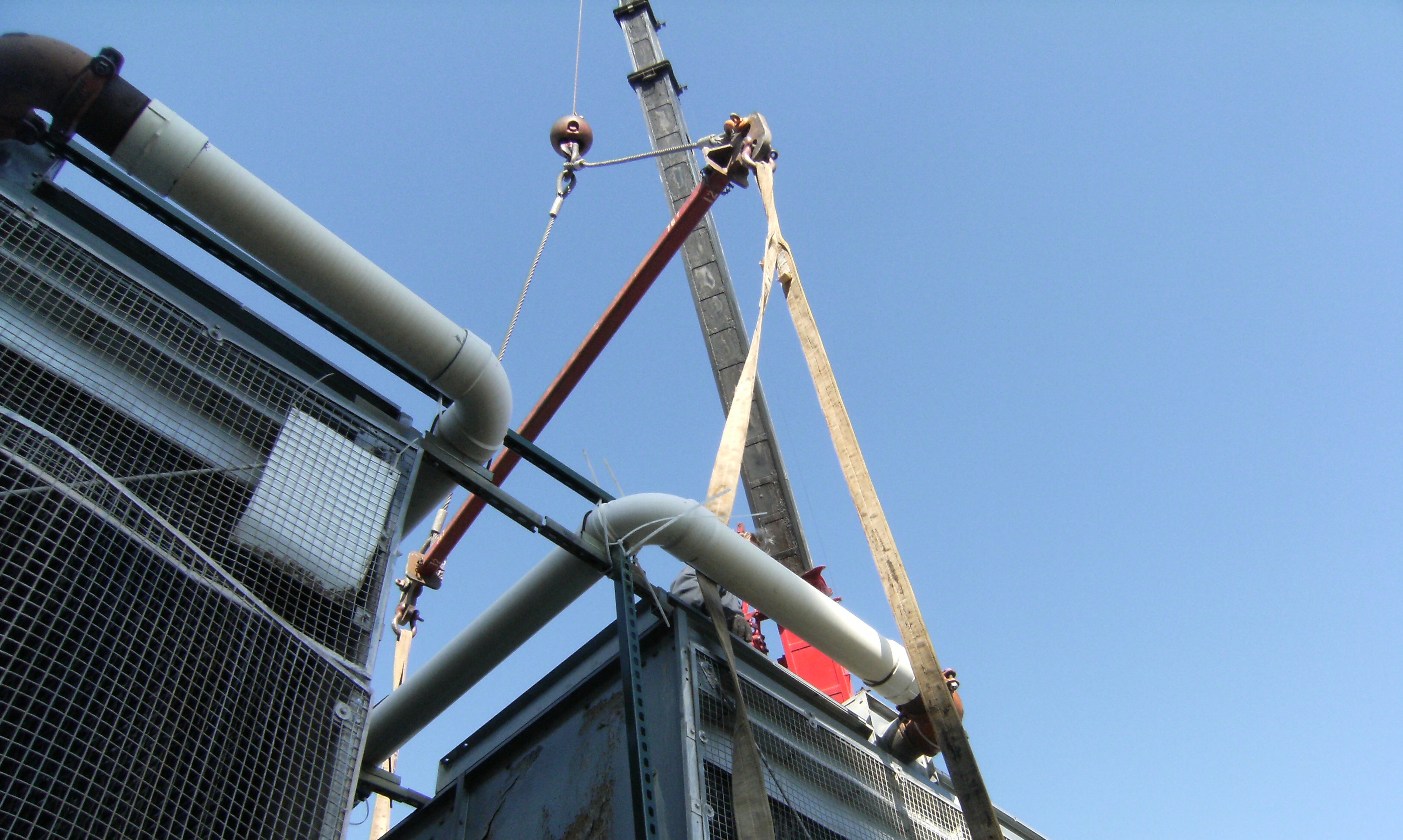 Boiler rigging operation at commercial facility
