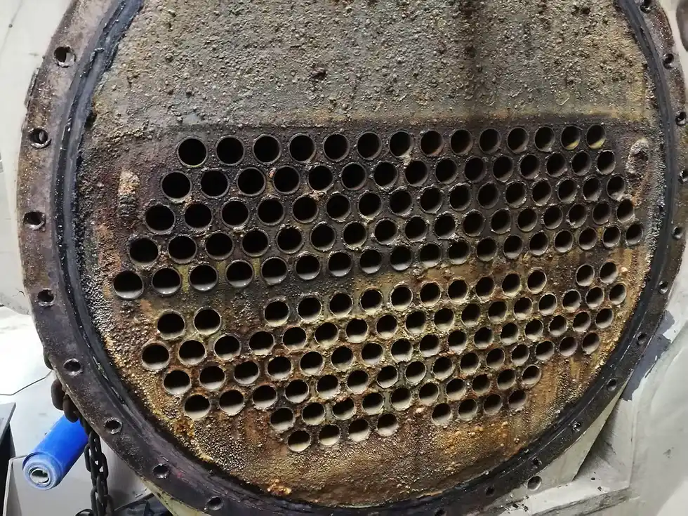 Chiller tube bundle before and after professional cleaning