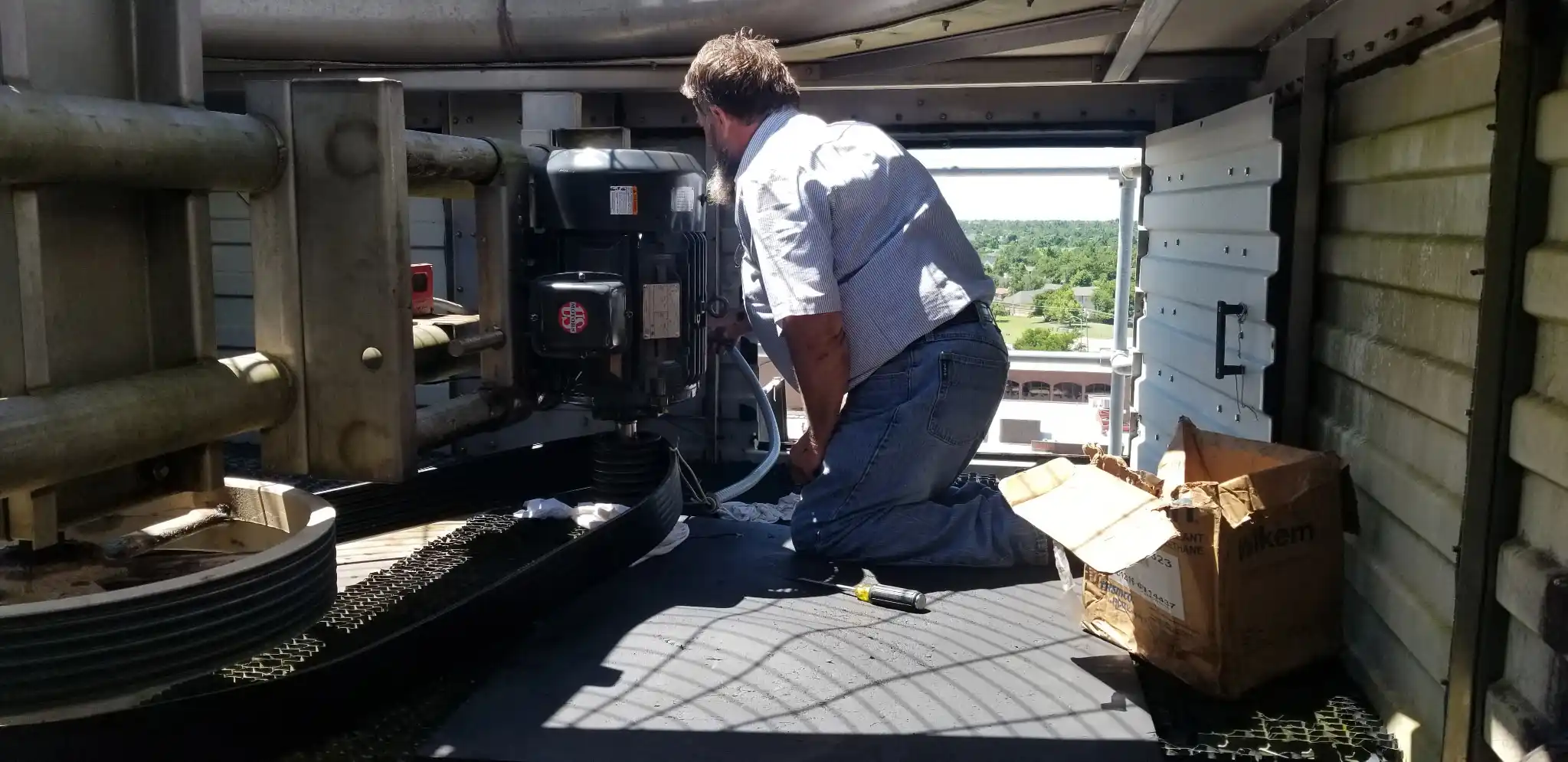 Cooling tower fan and motor assembly during maintenance
