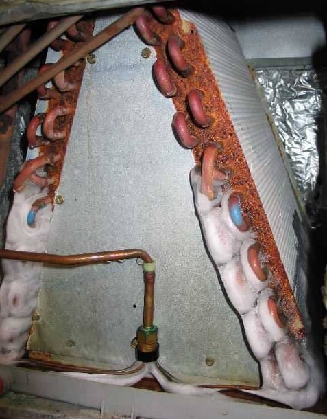 Frost formation on chiller evaporator indicating freeze risk