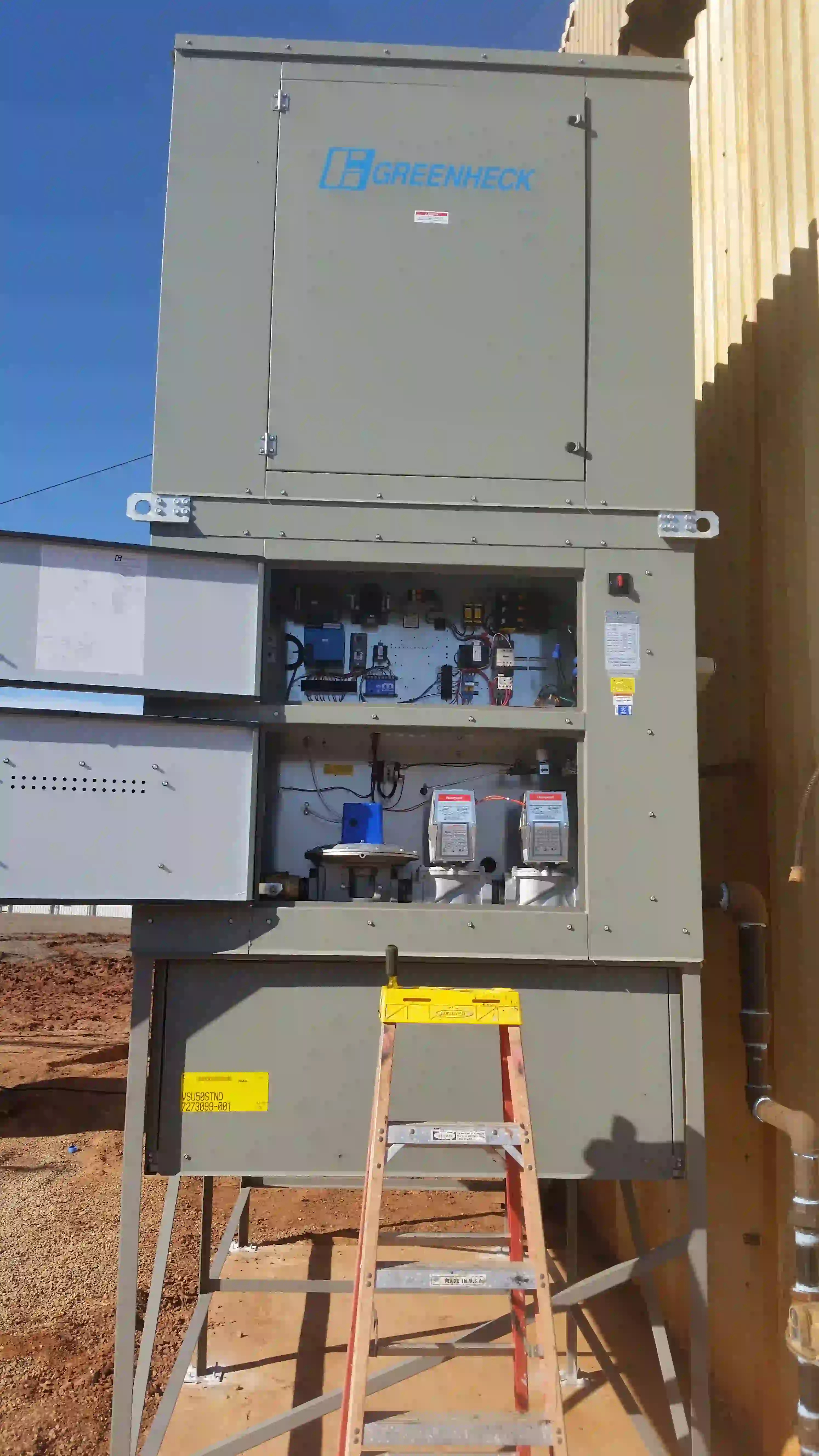 Interior view of the unit's control cabinet showing the gas train and flame safeguard controls